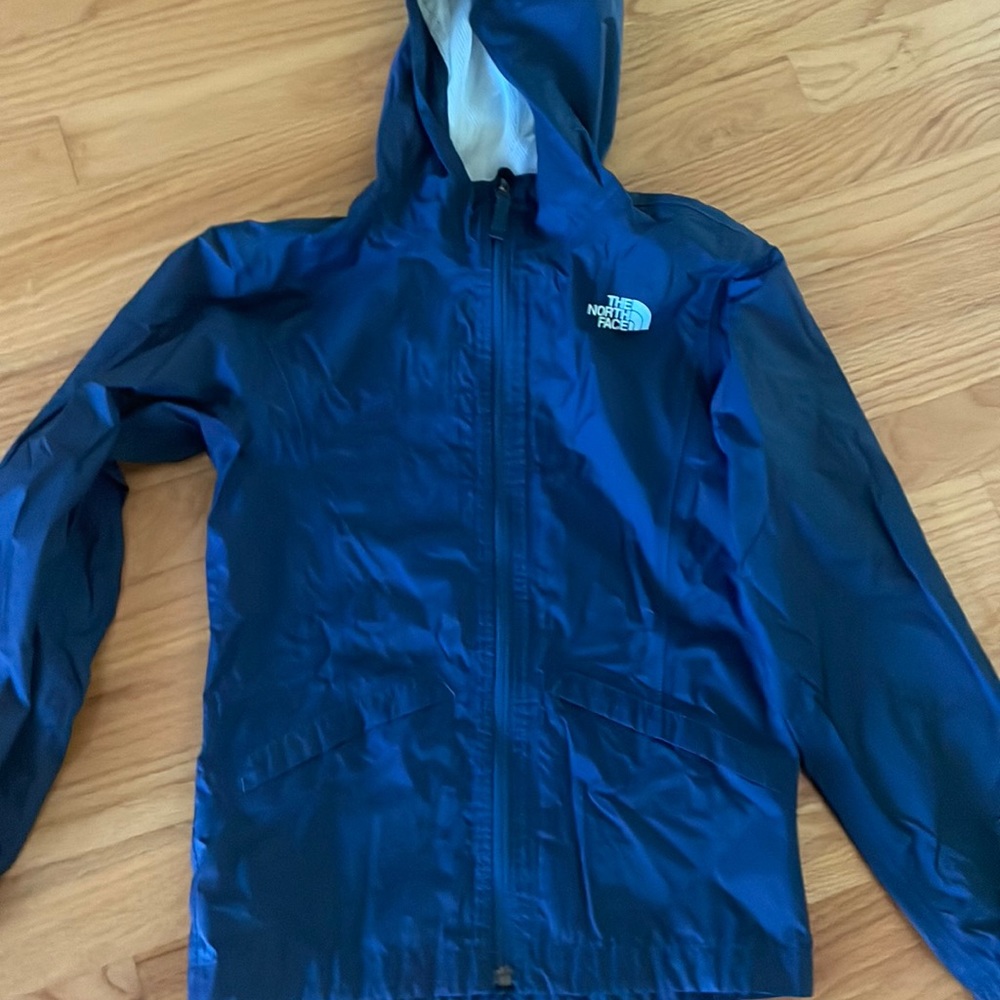 Girls North Face rain jacket. Size medium. 10–12.